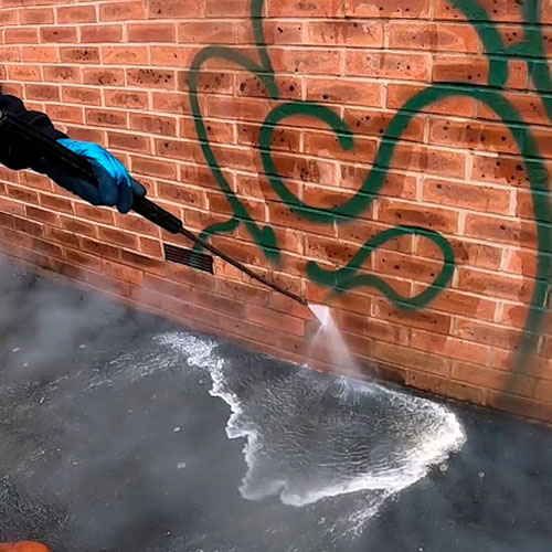 Graffiti removal from a building in Halifax, Nova Scotia.
