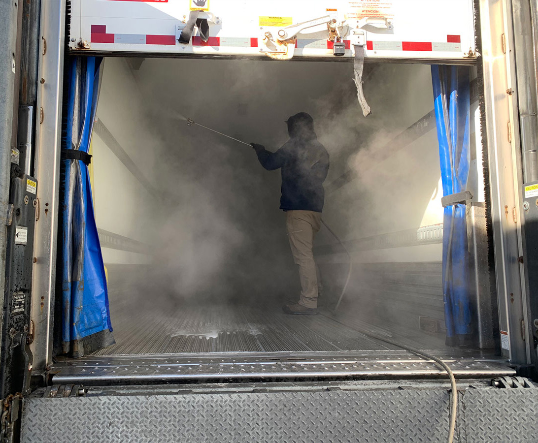 Interior of transport being power washed, Halifax.
