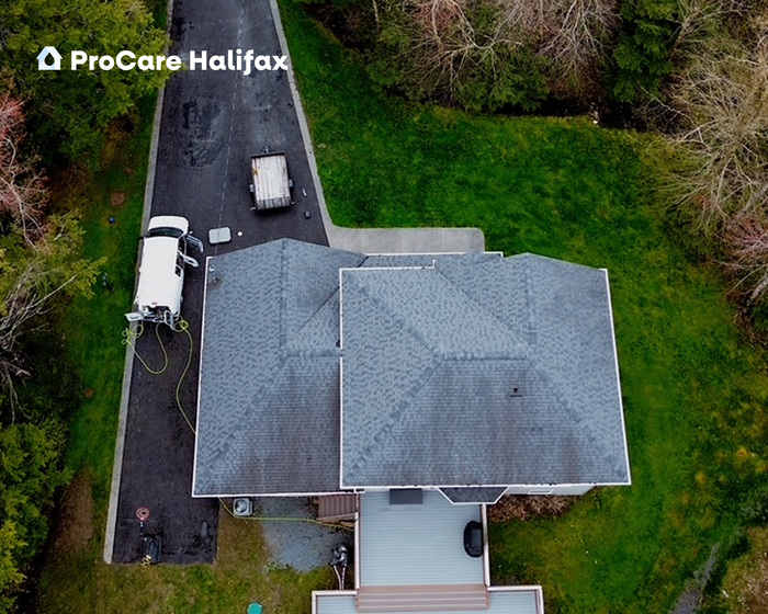 Aerial view of roof before cleaning showing black streaks and organic growth on shingles in Fall River Nova Scotia