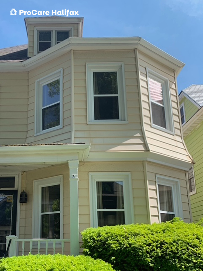 After house wash showing clean, restored siding on a home in the South End of Nova Scotia