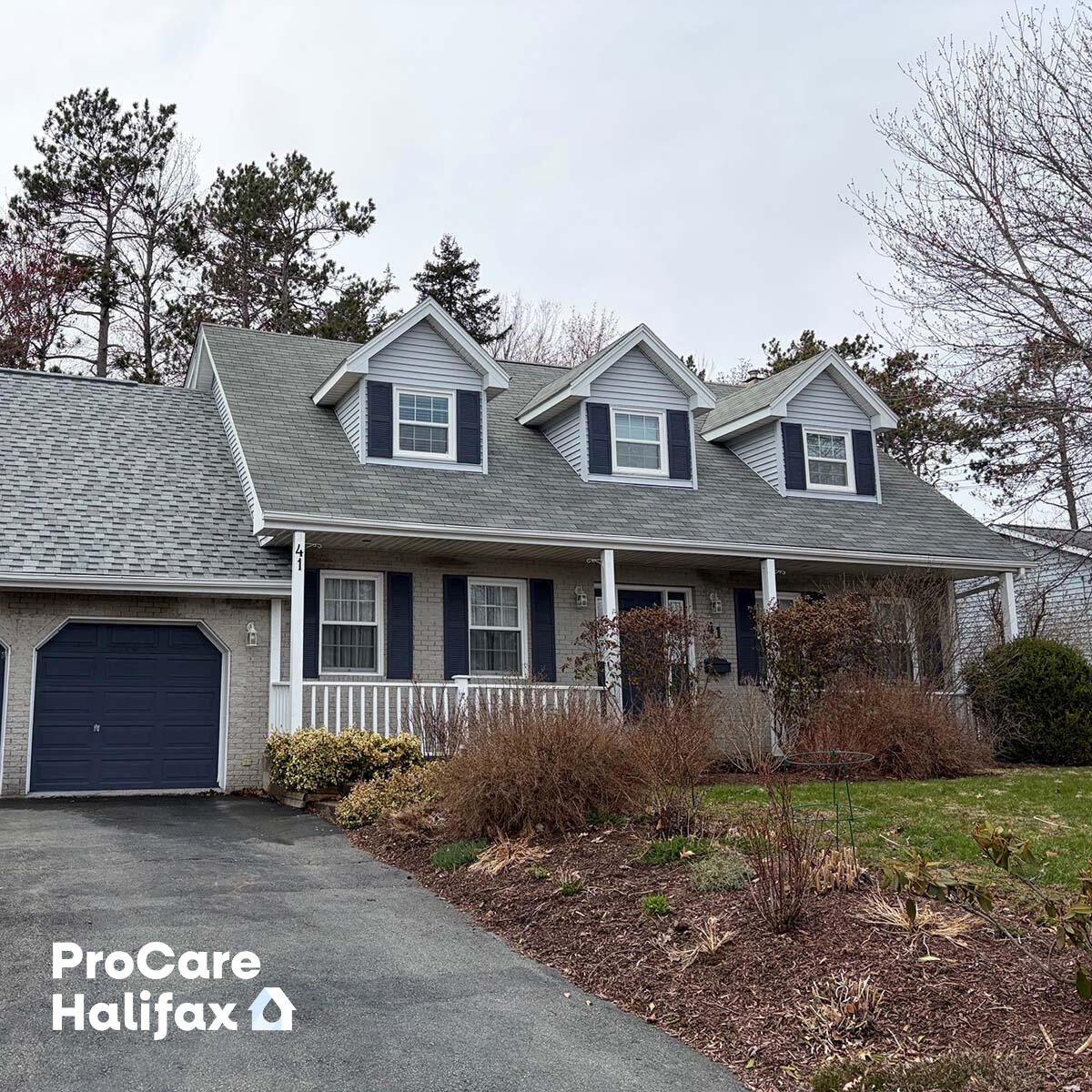 A clean, restored residential roof in Lower Sackville, Nova Scotia, with all black algae and organic growth removed following a professional soft wash treatment by ProCare Halifax.